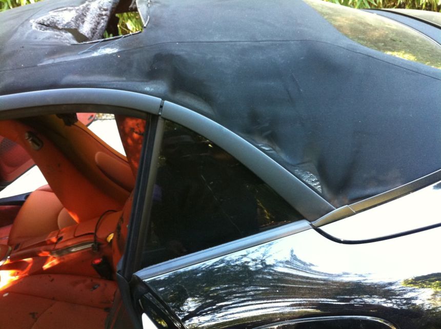Exhibit photo of damage to Kid Cudi’s car.