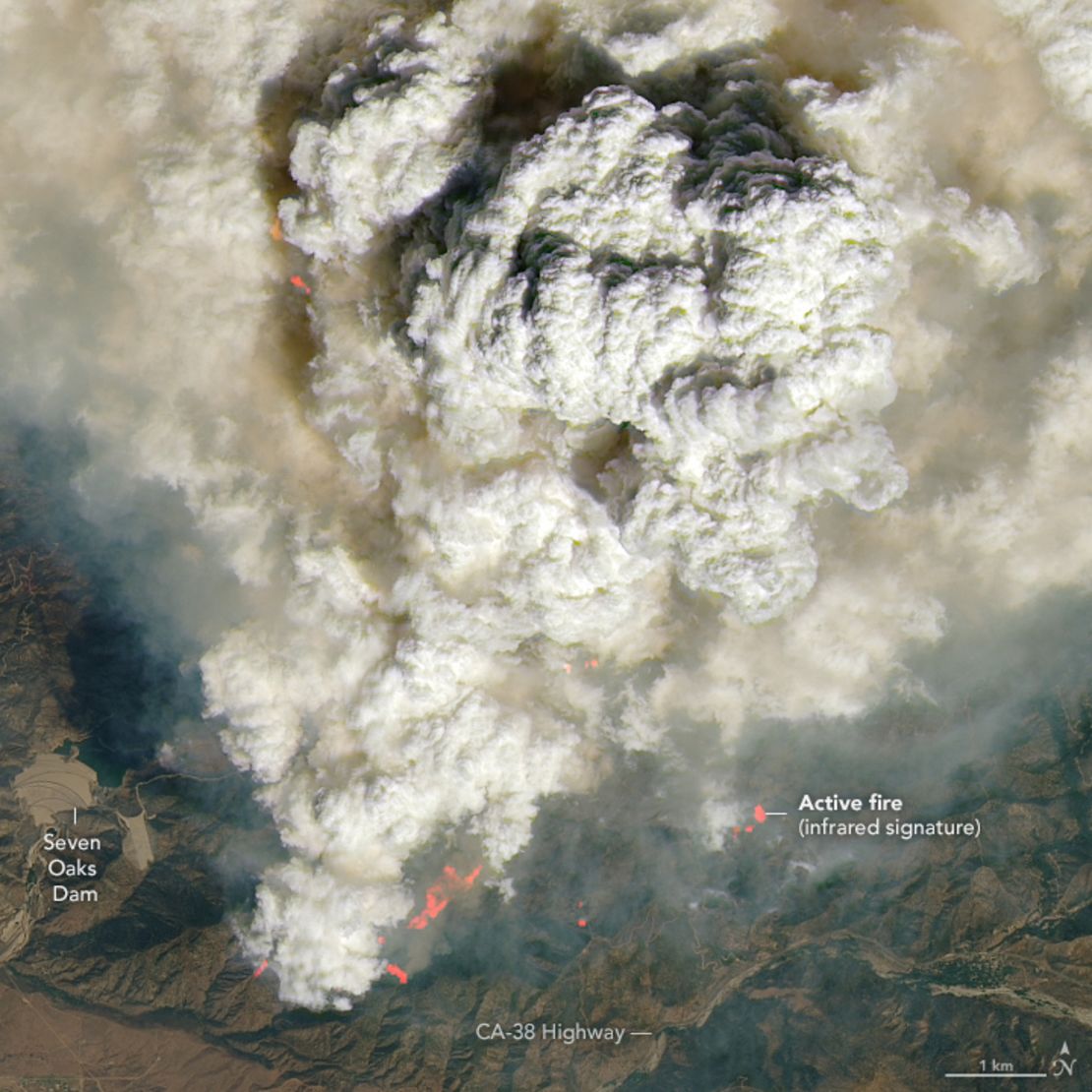 Satellite imagery captures the Line Fire's pyrocumulus clouds on Monday, September 9, 2024. Pink-ish and orange areas highlight active fire hot spots.