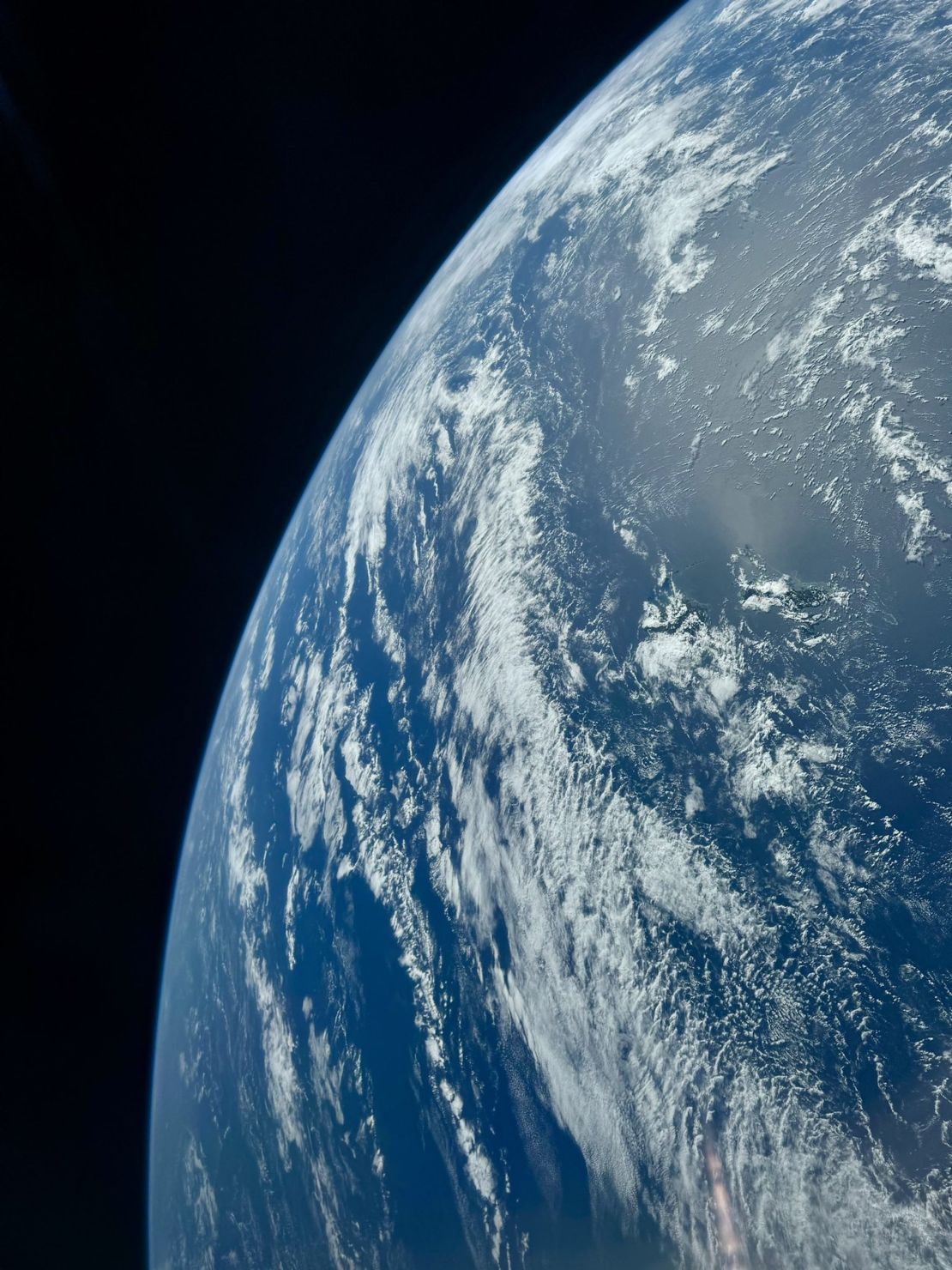 The crew members snapped a photo showcasing their view of Earth from the Crew Dragon capsule.