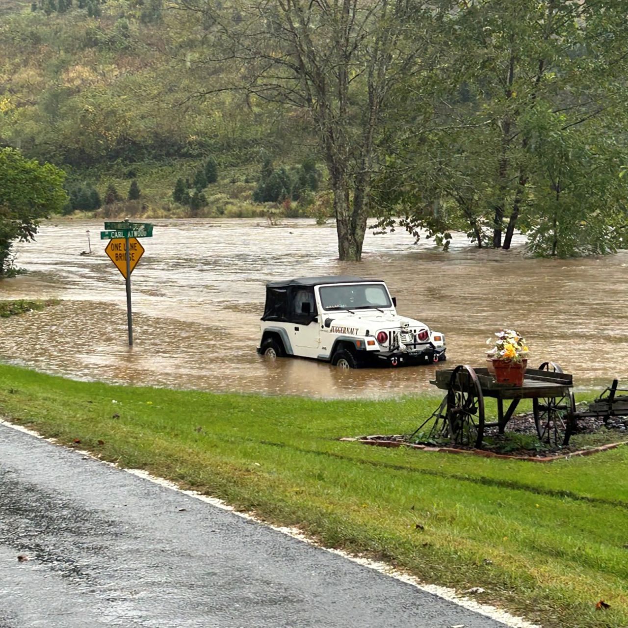 A road is flooded in western North Carolina on Friday, as seen in this photo posted to X by NCDOT.