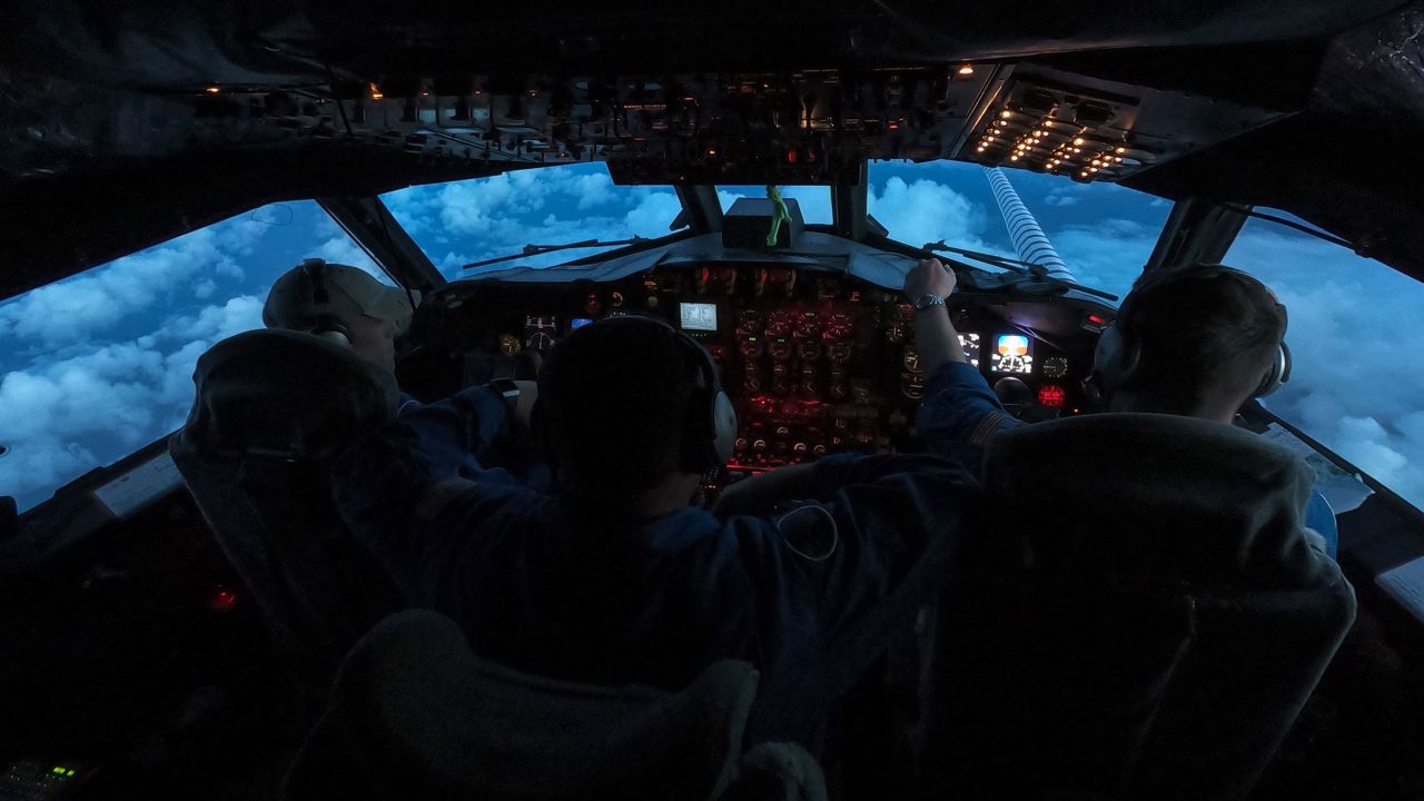 Crew fly a National Oceanic and Atmospheric Administration WP-3D Orion, nicknamed Kermit, through Tropical Storm Barry to collect data, over the Gulf of Mexico on July 11, 2019. Kermit and a twin plane, Miss Piggy, are sophisticated flying research labs that logged their first flights in the mid-1970s. (Chang W. Lee/The New York Times)