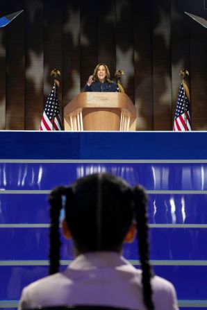 Amara Ajagu watches Harris formally accept her party's presidential nomination at the <a >Democratic National Convention</a> in Chicago on August 22. <a >Ajagu</a> is one of Harris' young grandnieces. Harris is the first Black woman and first Asian American to lead a major-party ticket. If elected, she would be the first woman and Indian American president.