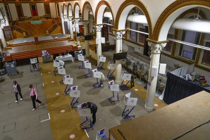 New Yorkers vote in the Mount Pisgah Baptist Church in Brooklyn on October 27.