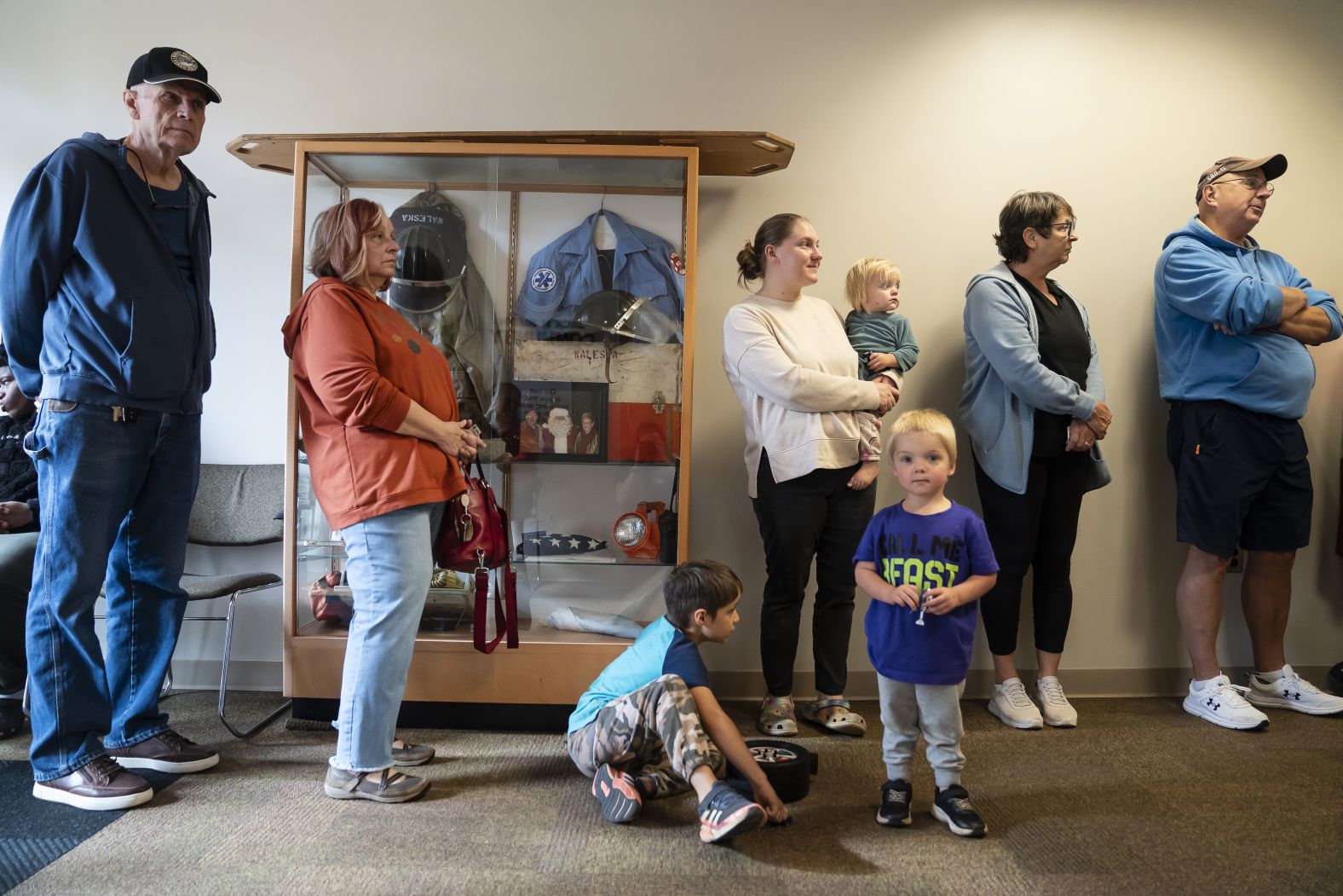 Voters and their children wait in line at a polling place in Waleska, Georgia, on Tuesday.