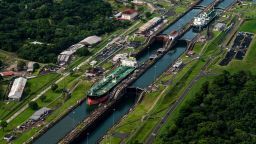 FILE -- Ships crossing the Gatún locks in the Panama Canal, July 10, 2024. To imagine the kind of future a hotter, dryer climate may bring, and the geopolitical challenges it will create, look no further than two parts of the world that President-elect Donald Trump says he wants America to control: Greenland and the Panama Canal. (Federico Rios/The New York Times)