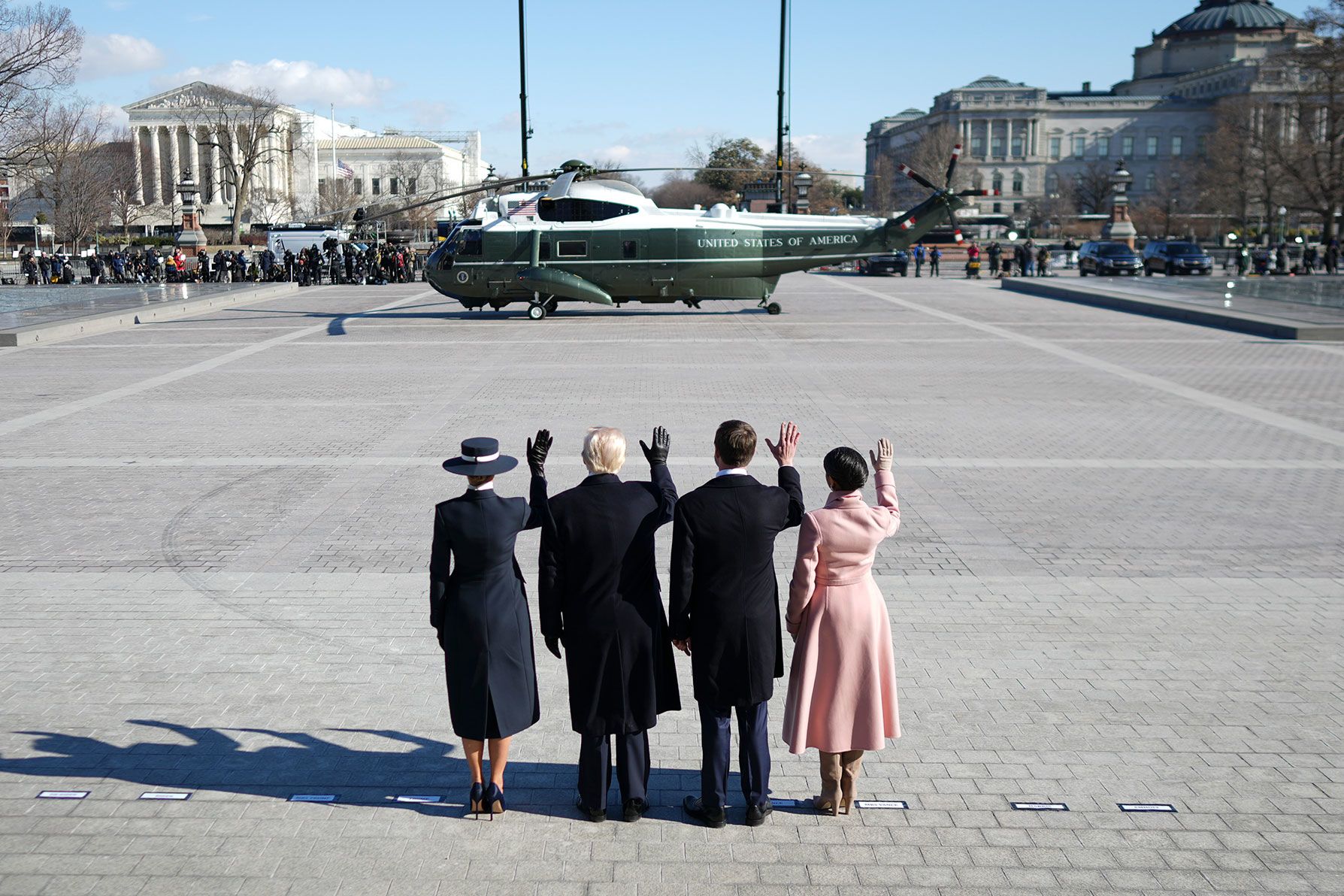 The Trumps and Vances wave farewell to the Bidens outside the Capitol.