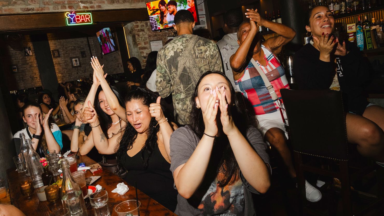 Viewers react during a "Love Island USA" watch party at the Malt House, a bar in the Greenwich Village section of New York, on July 1.