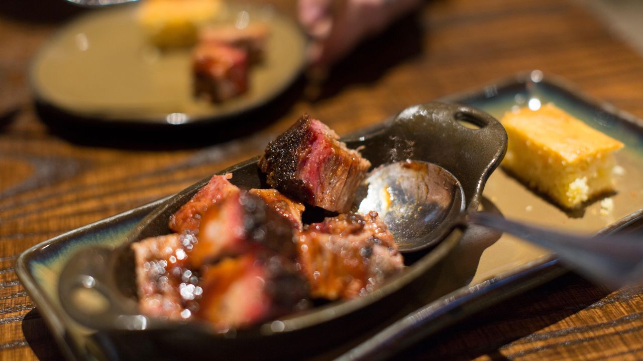 H3G0RW A BBQ plate of highly coveted burnt ends, Kansas City, MO.