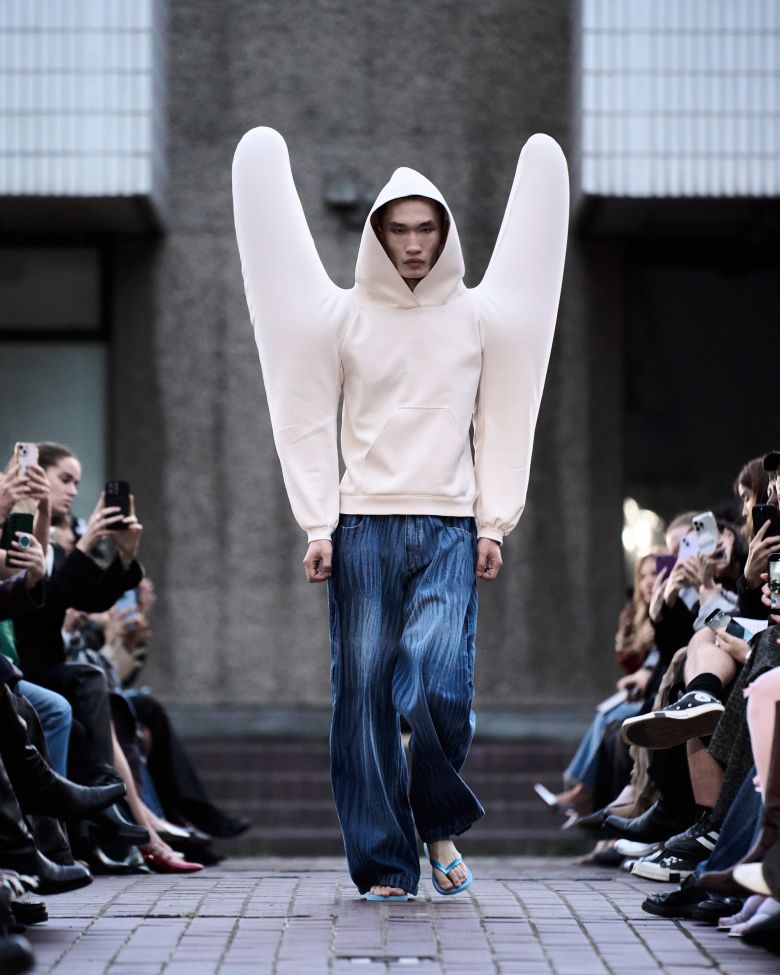 HARRI, a designer typically known for his circus-like balloon pieces, presented a much wearable version for his first ready-to-wear collection. Of course, with a few token inflatable pieces just for fun.