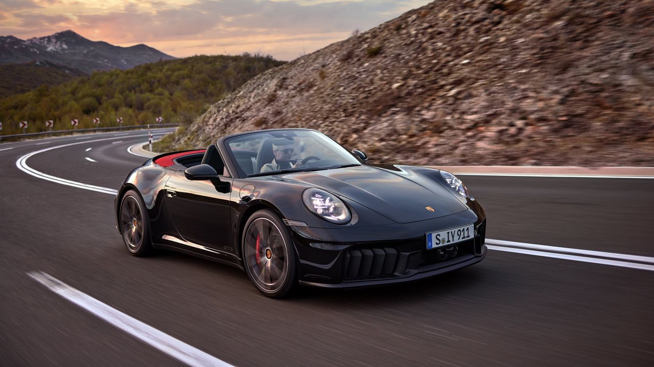 Porsche unveils its first hybrid 911 model.