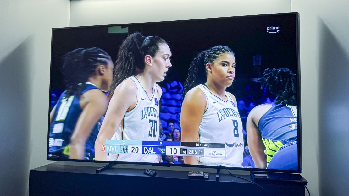 new york liberty players Breanna Stewart and Nyara Sabally seen on the hisense 110ux championship edition TV 