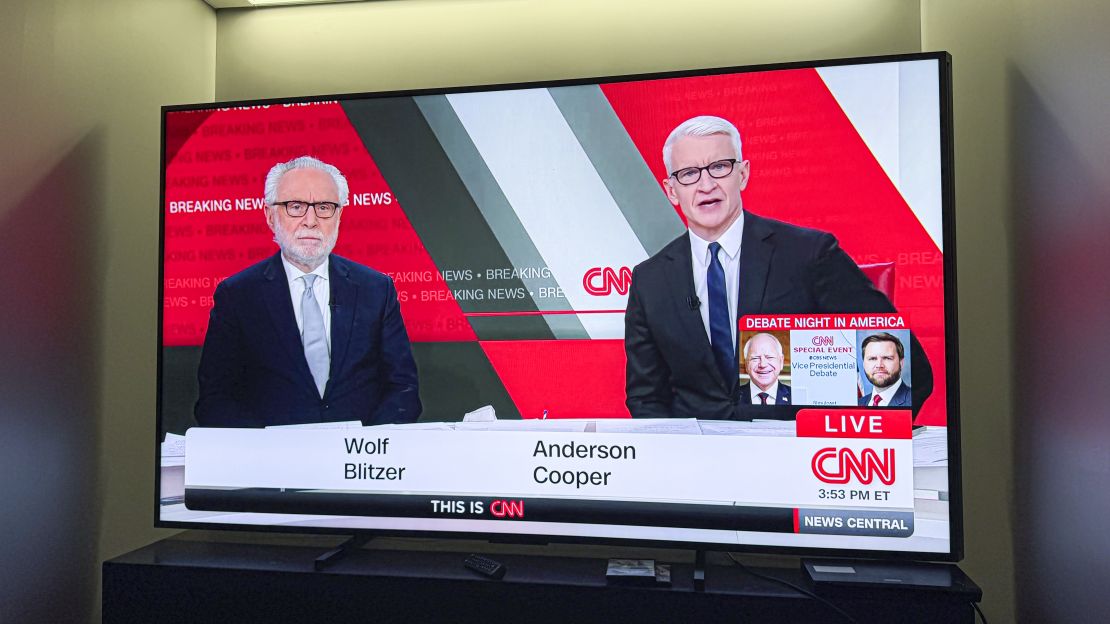 (L, R) Wolf Blitzer and Anderson Cooper on CNN appear on the hisense 110 ux champion edition tv