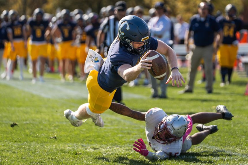 Jack Curtis leaps forward during a game earlier this season.