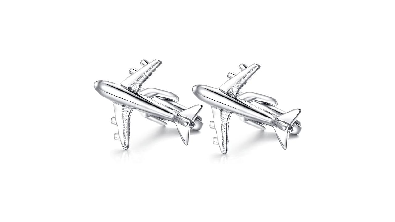 A photo of two airplane cufflinks from Honey Bear