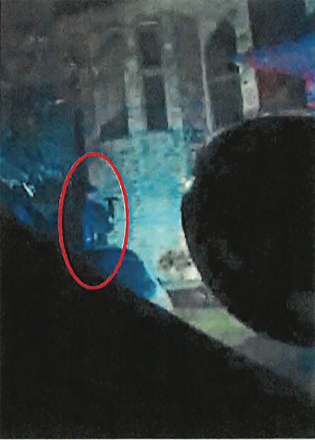 An image from law enforcement show's a figure outside the Hortman home.