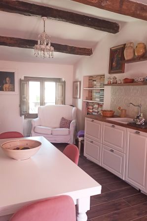 <strong>Think pink: </strong>This 732-square-foot home in Isca sullo Ionio looks warm and inviting after being remodeled at a cost of $35,000 (€32,200).