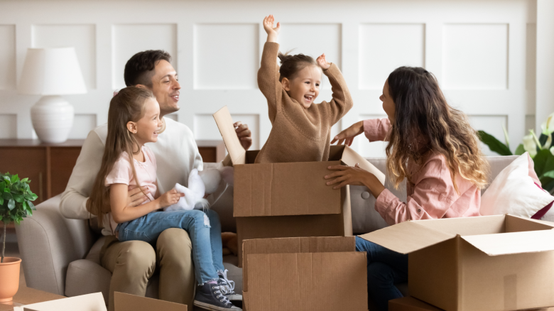 Family celebrating after moving into a new home