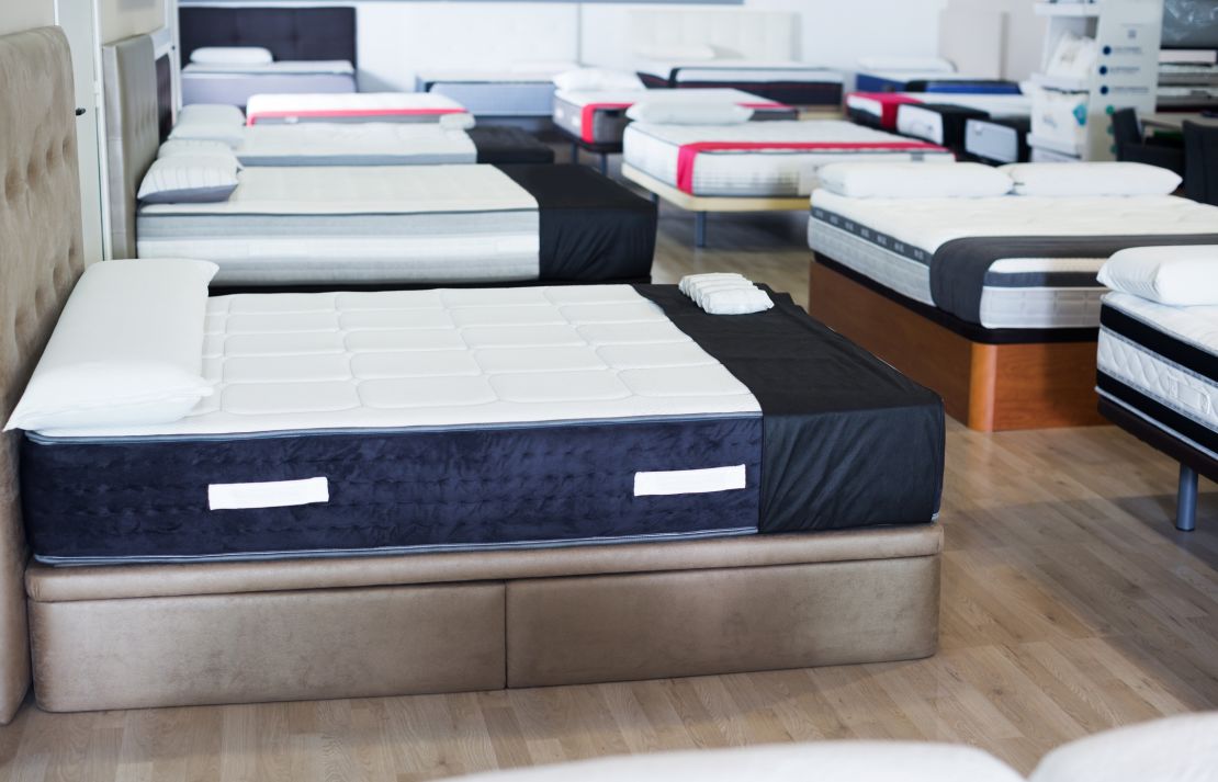 new style mattresses on the beds in the store.