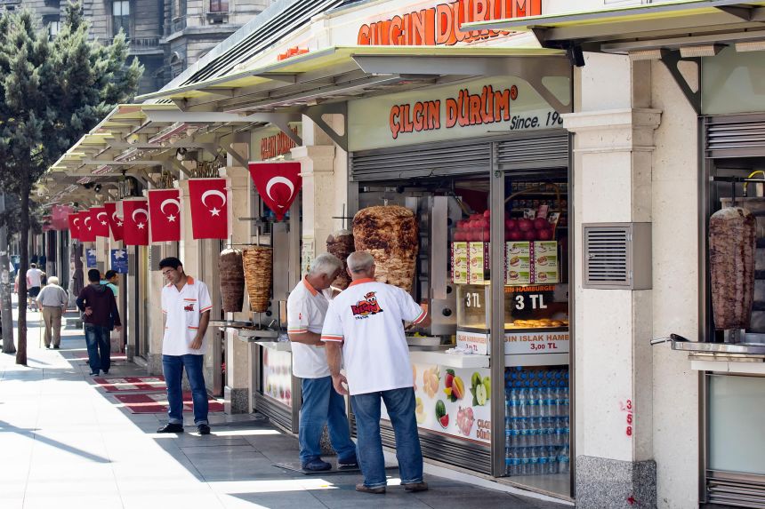 Eateries selling döner kebap line streets near Taksim square in Istanbul.