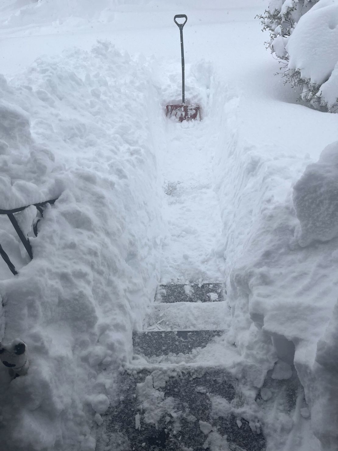 Large amounts of snow piled up at a home in Erie County, Pennsylvania, on Saturday morning.