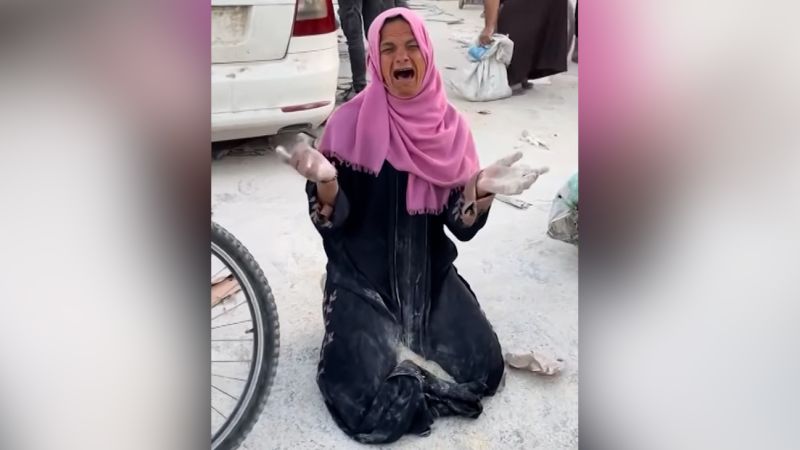 ‘You’ve starved us’ Palestinian mother desperately tries to gather flour