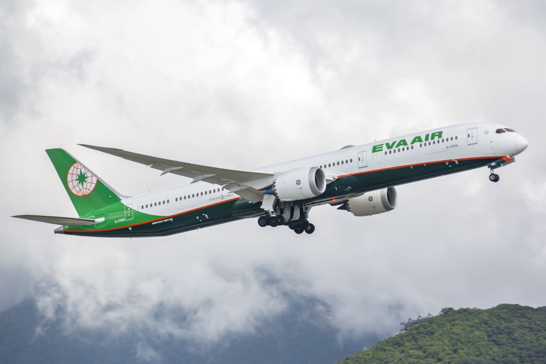 A photo of an EVA Air Boeing 787-10 aircraft departing from Hong Kong International Airport