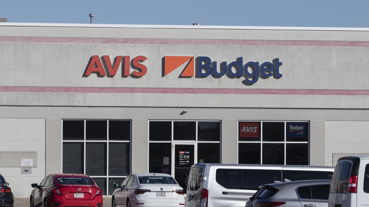 A photo of the exterior of an Avis and Budget rent-a-car location in Dayton, Ohio
