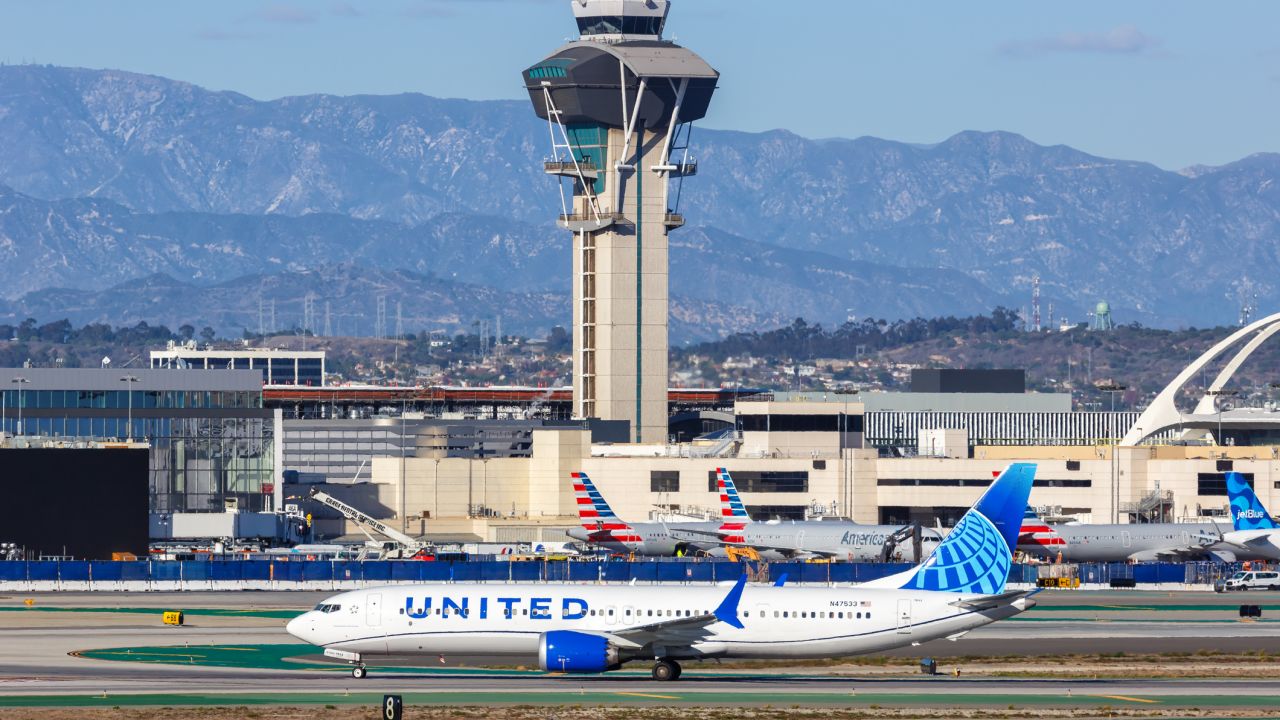 A photo of a United Airlines 737 MAX 9 on the runway at LAX