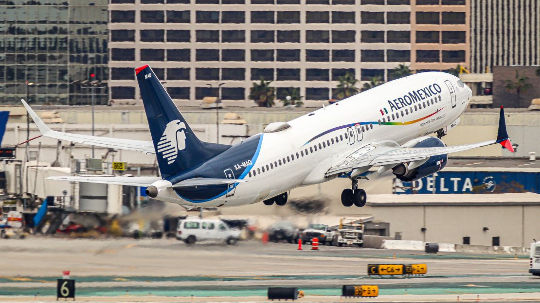 A photo of an Aeromexico Boeing 737 MAX taking off in Los Angeles