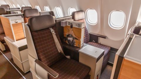 A photo of an empty business class seat on a Swiss Airbus A340-300