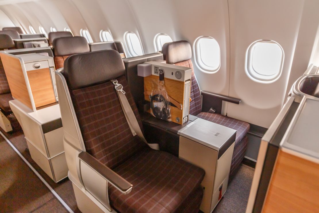 A photo of an empty business class seat on a Swiss Airbus A340-300