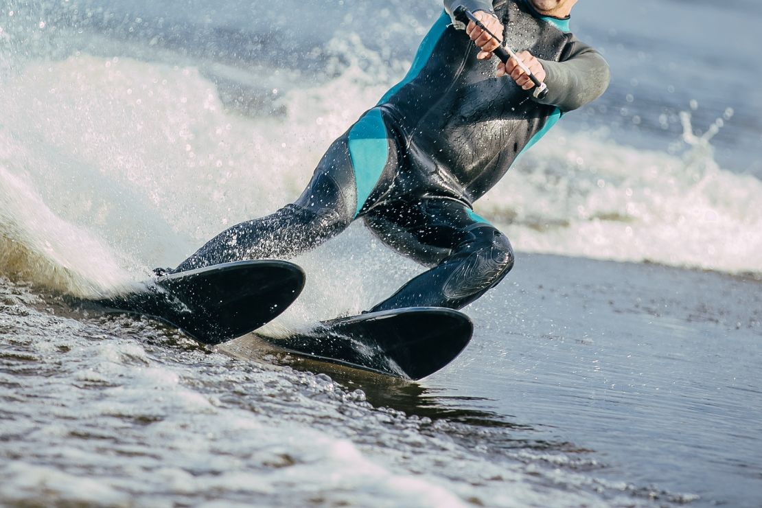 A photo of a person water skiing on a lake