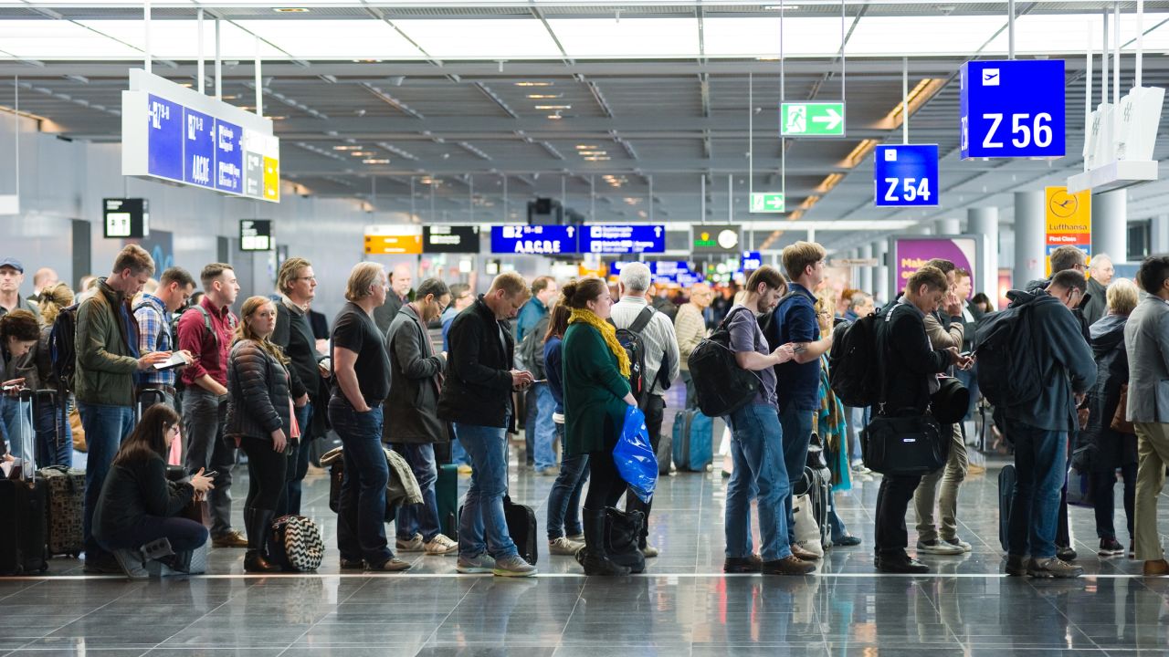 A photo of passengers waiting for a flight in Frankfurt Airport
