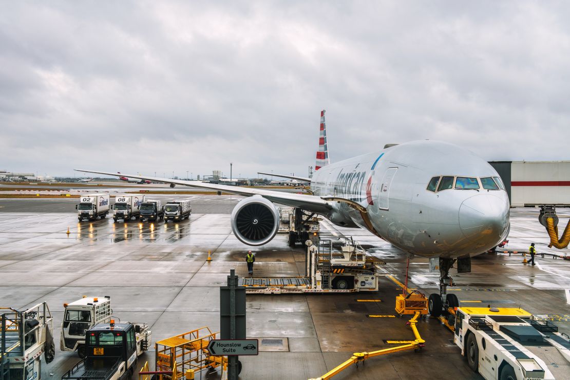 A photo of an American Airlines Boeing 777 being serviced at London Heathrow Airport