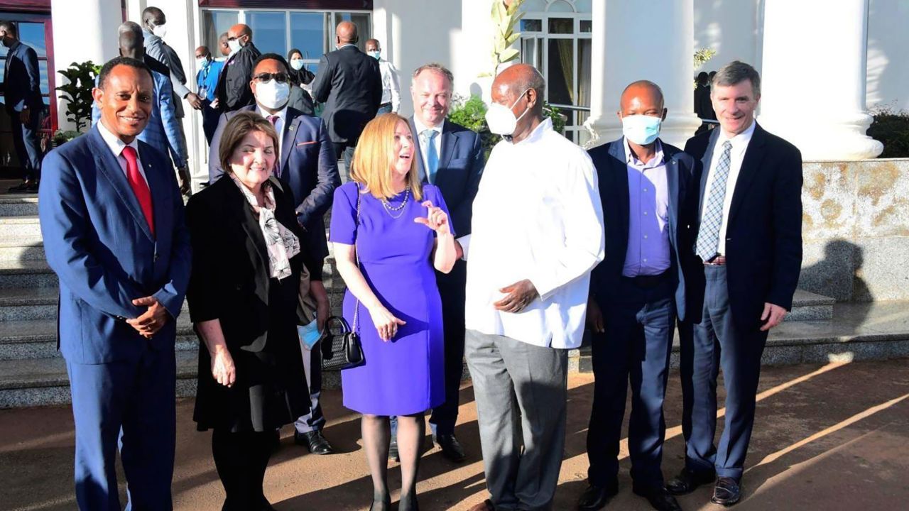 Family Watch International founder Sharon Slater (in purple) is pictured with Ugandan President Yoweri Museveni (wearing a facemask) outside Ugandaâ€™s State House in April during a conference on so-called â€˜family valuesâ€™ SOURCE: Facebook/National Resistance Movement