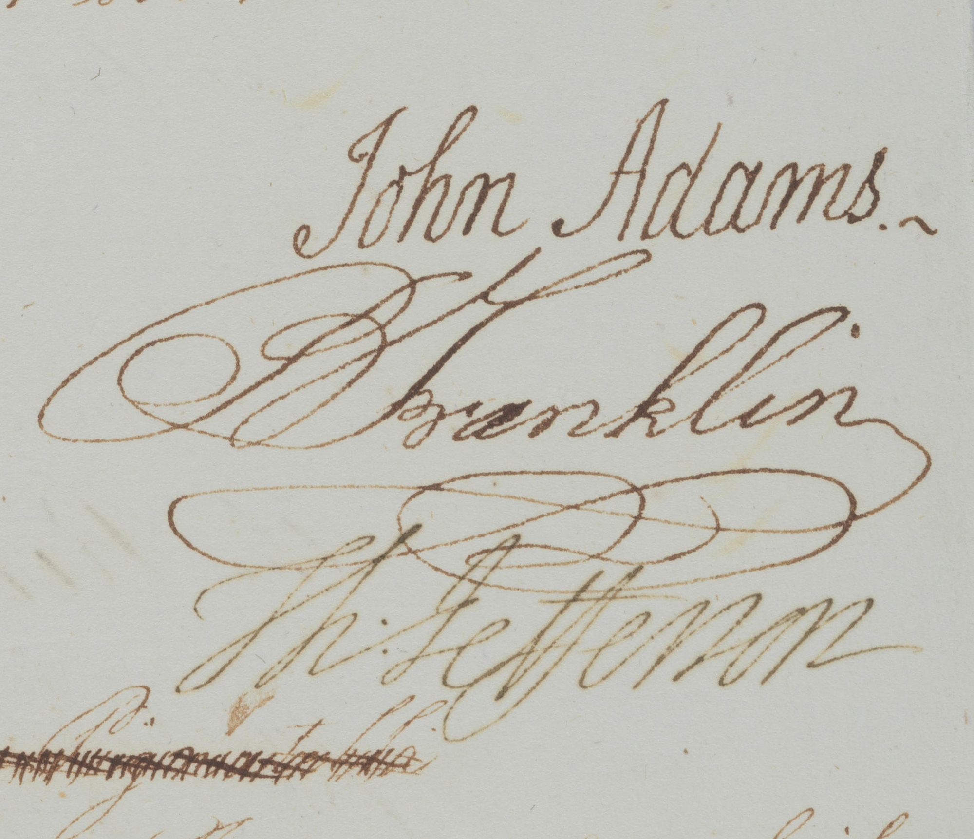 The signatures of John Adams, Benjamin Franklin and Thomas Jefferson as seen on the letter.