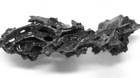 A fragment of the organic glass found inside the skull of the deceased individual in Herculaneum.