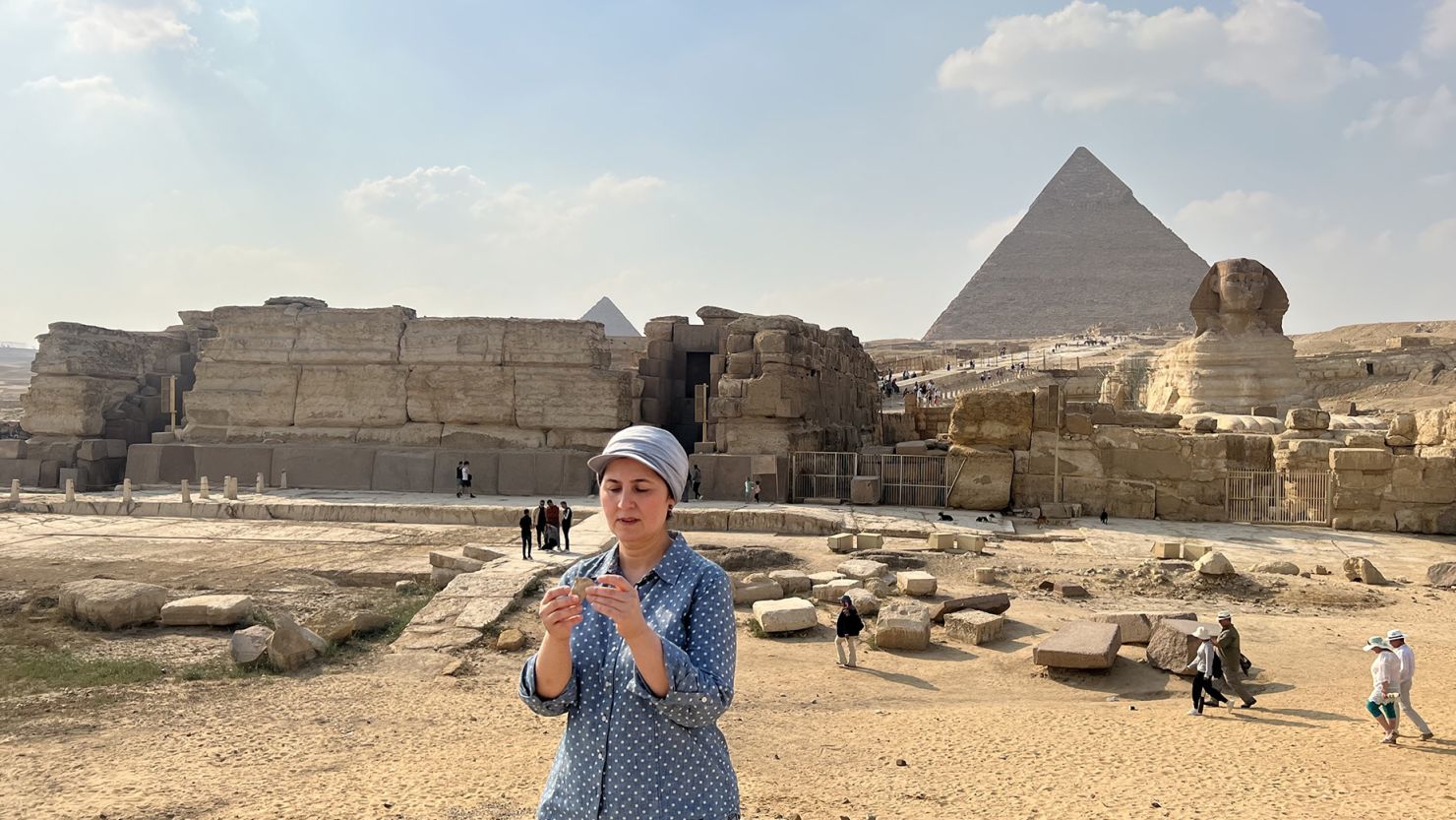 Researcher Eman Ghoneim studies the surface topography of the extinct section of the Nile located in front of the pyramids of Giza and the Great Sphinx.