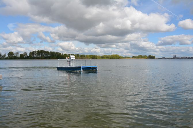 RanMarine Technology’s MegaShark has no onboard operator and is remotely controlled as it cleans a lake in the Netherlands.