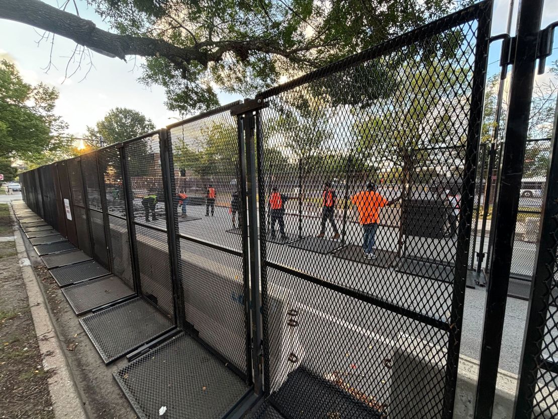 Chicago workers erected an additional row of security fencing in front of the United Center on Tuesday morning.