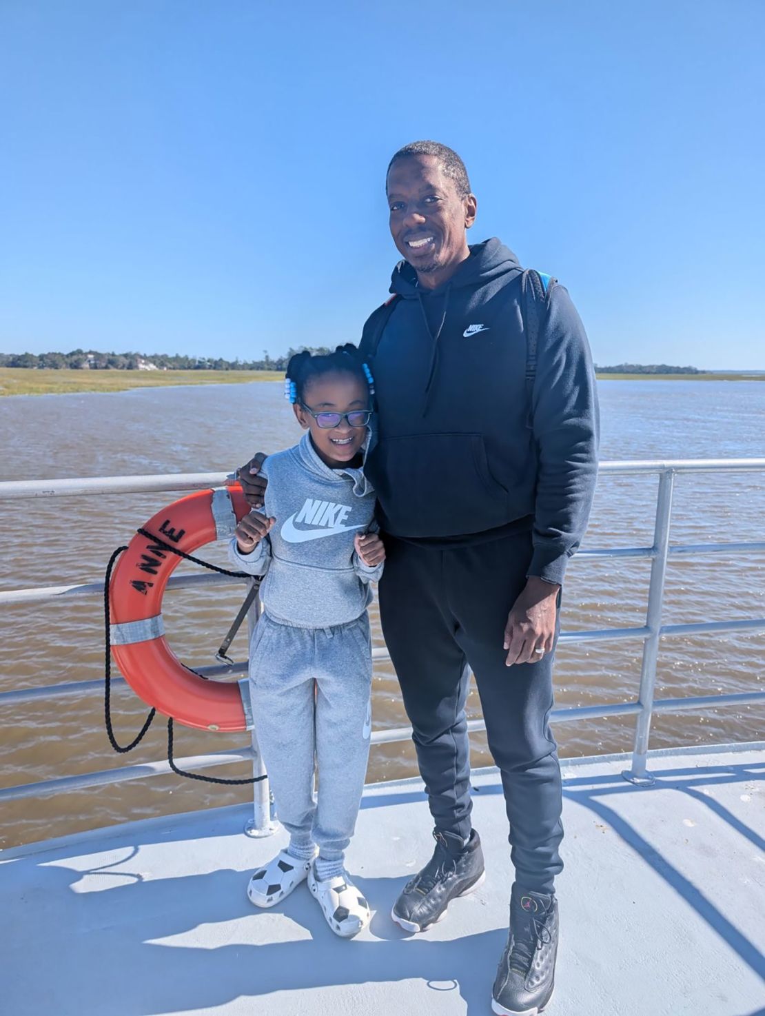 Michael Wood and daughter Hailey, 8, on a ferry to Sapelo Island on October 19.