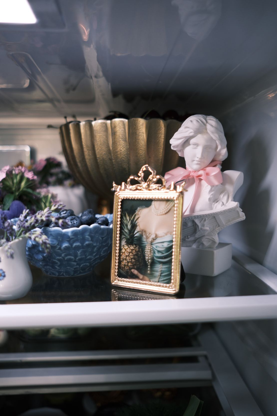 Busts, picture frames and ornate bowls dotted Judish's fridge for her "Bridgerton" — or "Fridgerton" — theme.