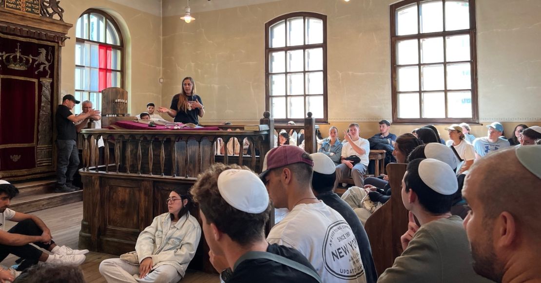 Hila Weisz-Gut is seen educating visitors at the Oshpitzin Jewish Museum in Oświęcim.