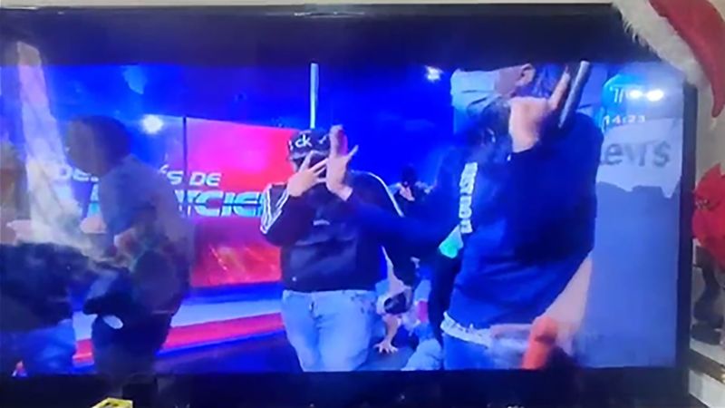 Armed men interrupt live TV station in Ecuador