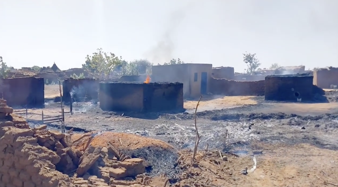 The aftermath of a strike on central Zamzam, seen in a frame taken from social media video posted to Facebook on December 18.