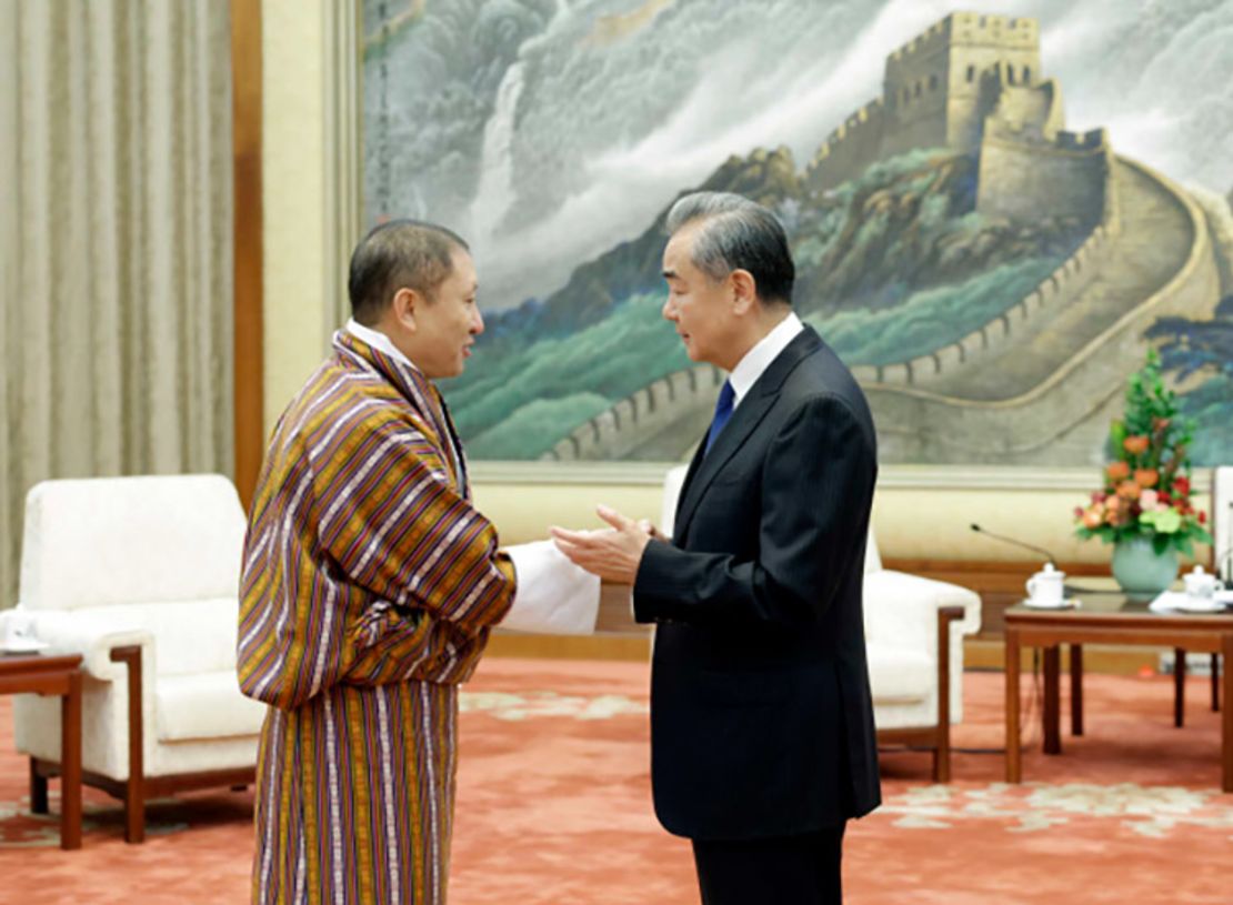 Bhutanese Foreign Minister Tandi Dorji, left, and Chinese Foreign Minister Wang Yi meet in Beijing in October 2023.