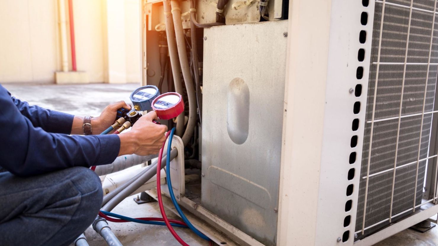 Technician performing an HVAC tune-up