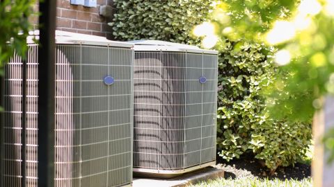 Two residential air conditioners