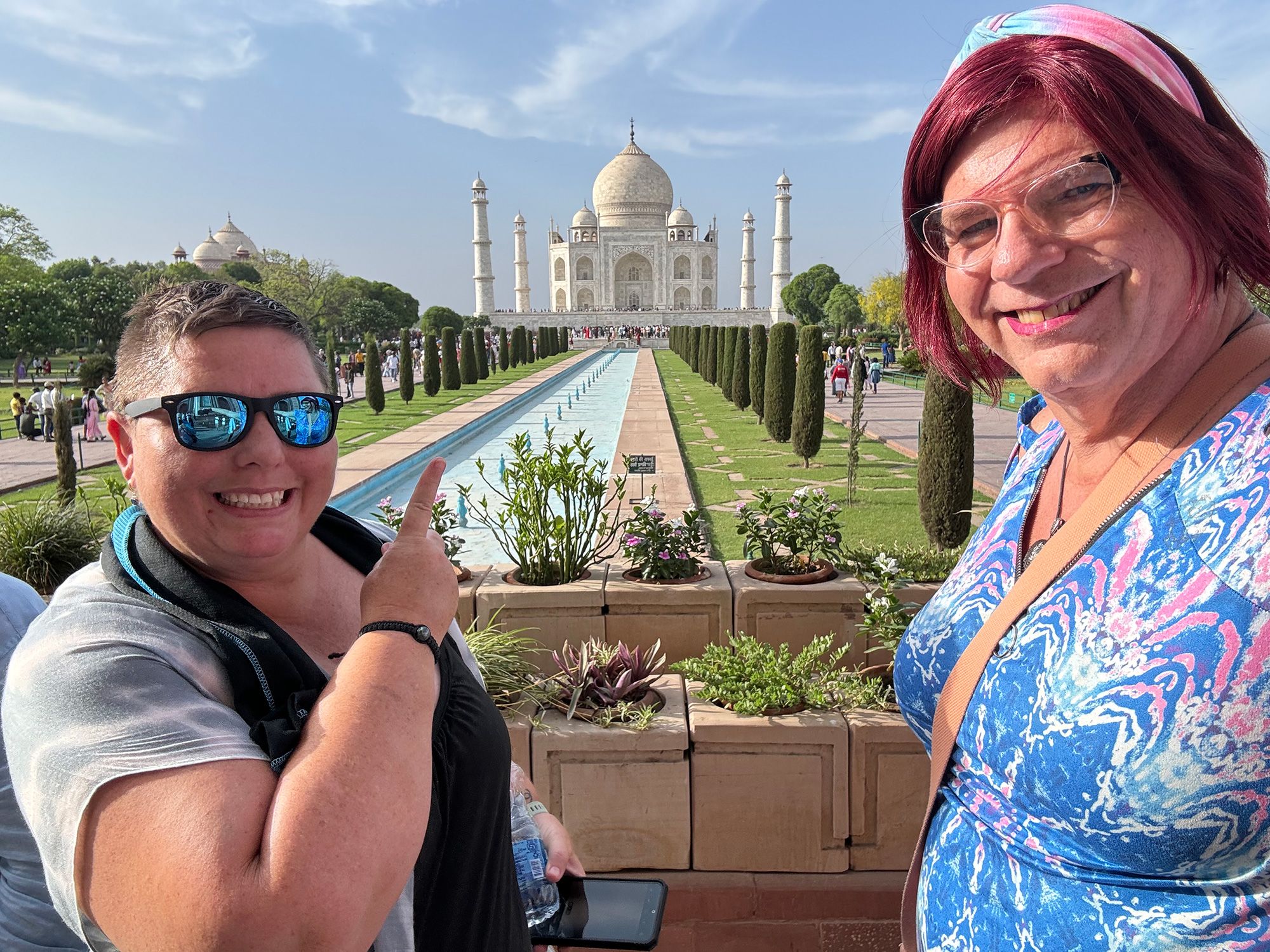 Tam Asbury, left, and Bobbi Waterman during a visit to the Taj Mahal in India. The couple met on the deck of a cruise ship, watching the sunrise over Fiji, back in 2013.