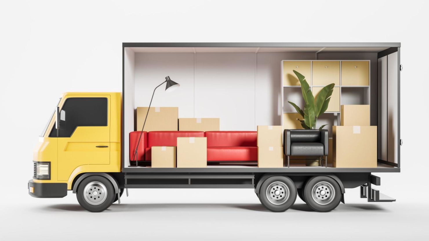 Moving truck filled with boxes, furniture and a plant